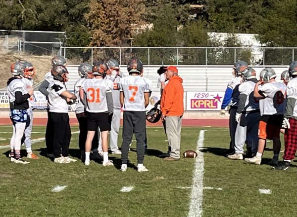 Coach talks at practice