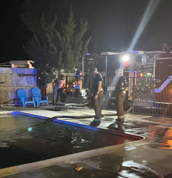 Firefighters look at pool