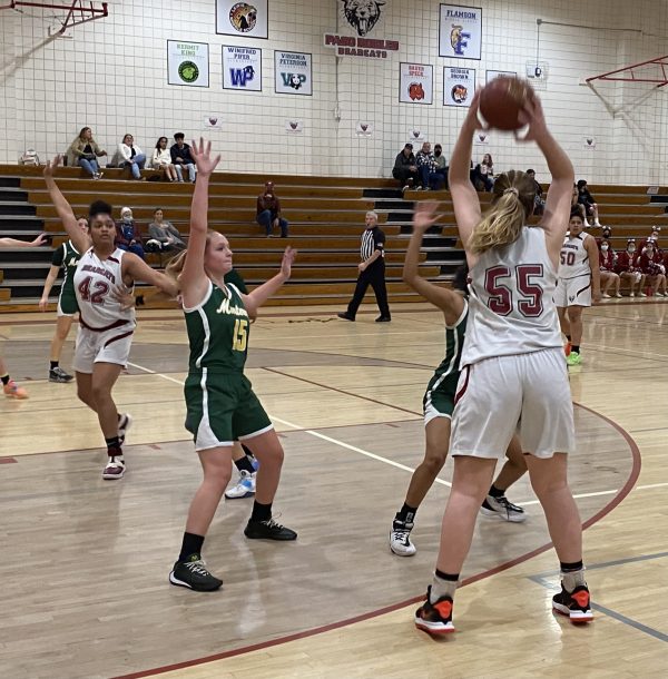 Jacey Loewen looks to pass inside
