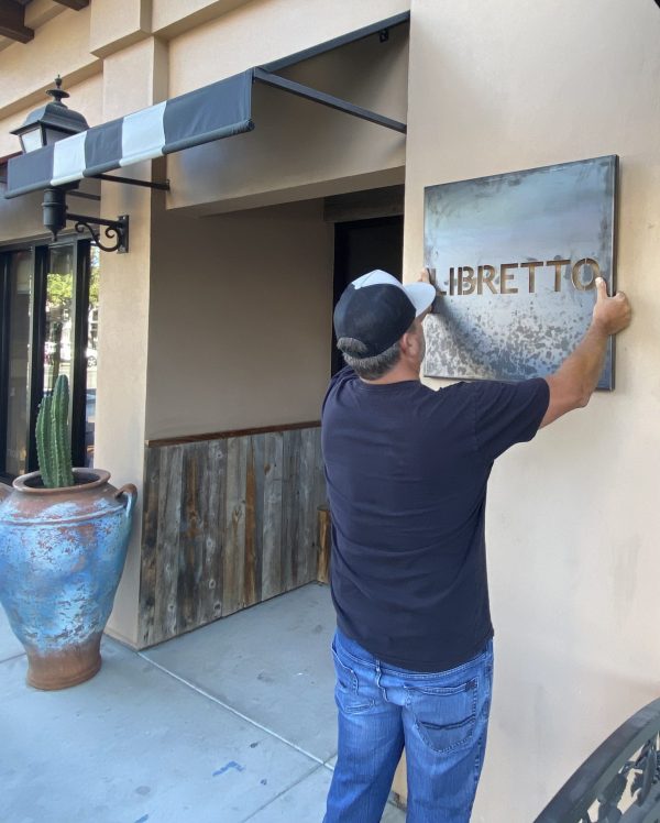 Justin sorrentino with Libretto Sign