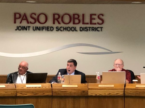 Trustee Chris Bausch asks question of staff